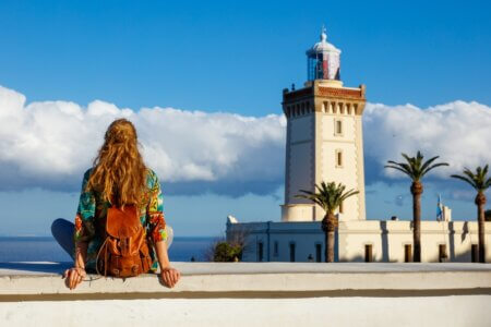 tourist looking at cap spartel, tanger