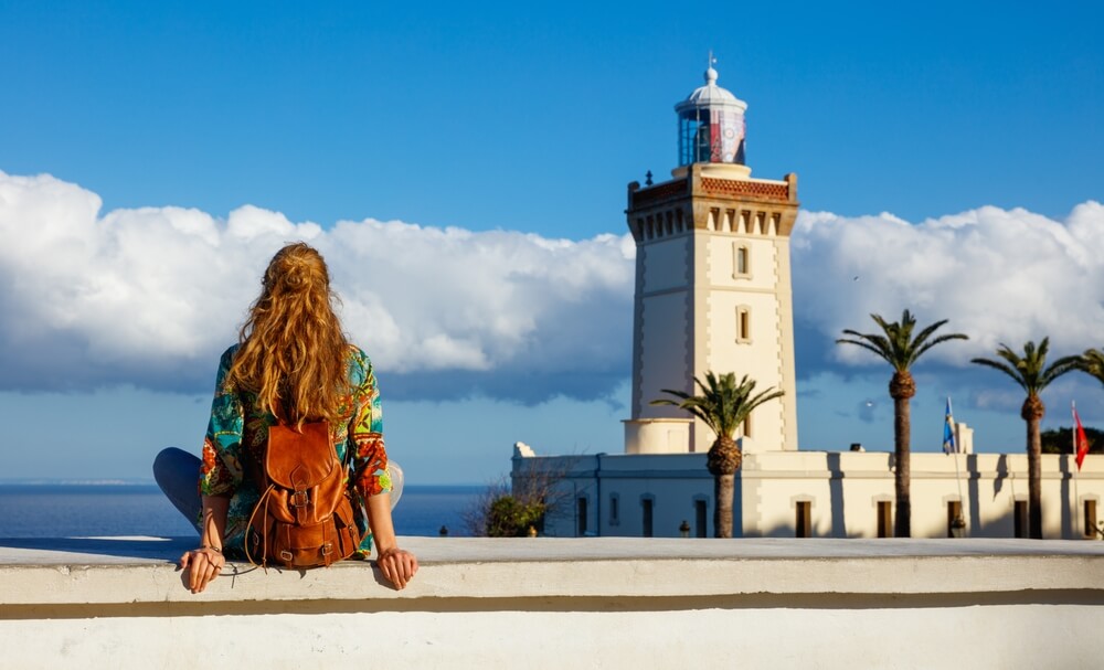 tourist looking at cap spartel, tanger